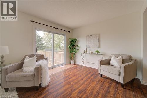Walk-out to large deck - 465 Colt Street, Waterloo, ON - Indoor Photo Showing Living Room