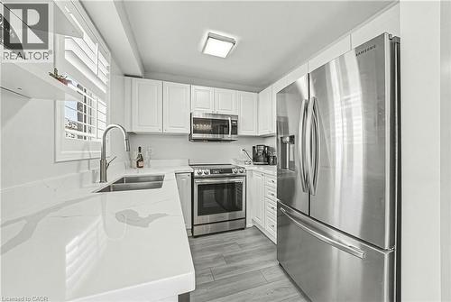 2259 Seton Crescent, Burlington, ON - Indoor Photo Showing Kitchen With Double Sink