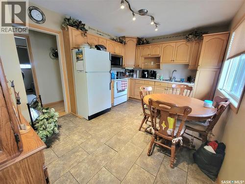 303 3 Street E, Wilkie, SK - Indoor Photo Showing Kitchen With Double Sink