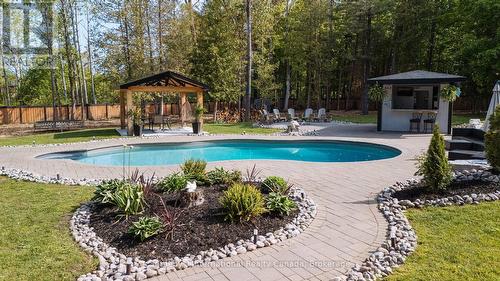 129 Bass Line, Oro-Medonte (Prices Corners), ON - Outdoor With In Ground Pool With Deck Patio Veranda With Backyard