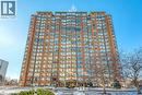 Multi-story building featuring a brick facade with numerous windows - 1270 Maple Crossing Boulevard Unit# 1705, Burlington, ON  - Outdoor With Facade 