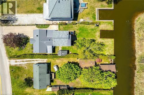 Aerial perspective showcasing multiple properties along a canal - 270 Erie Boulevard, Long Point, ON - Outdoor With View