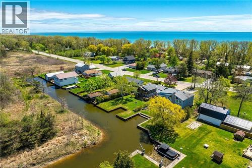 Waterfront properties featuring private boat docks and direct canal access - 270 Erie Boulevard, Long Point, ON - Outdoor With Body Of Water With View