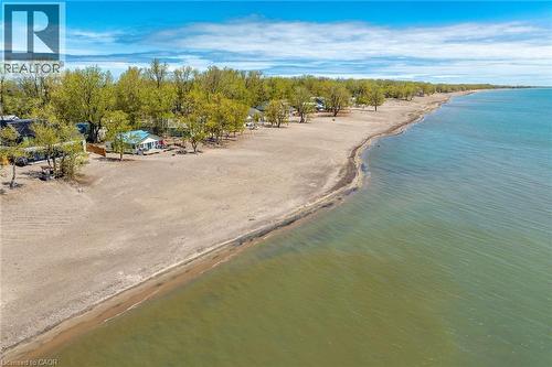 Expansive sandy beach frontage with direct water access - 270 Erie Boulevard, Long Point, ON - Outdoor With Body Of Water With View
