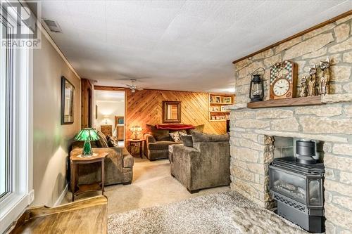 82A Pennie Avenue, Tehkummah, ON - Indoor With Fireplace
