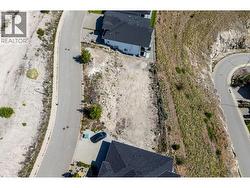 The Lot is the one on the RIGHT when standing on the road - 