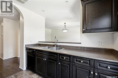 570 150 Langlois Way, Saskatoon, SK - Indoor Photo Showing Kitchen With Double Sink