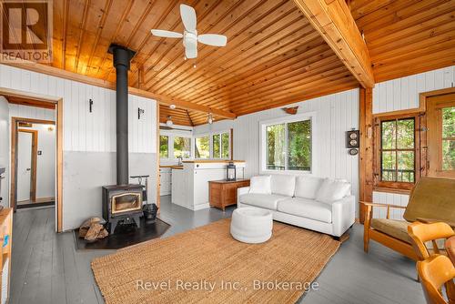 8004 Taits Beach Road, Hamilton Township (Bewdley), ON - Indoor Photo Showing Living Room With Fireplace