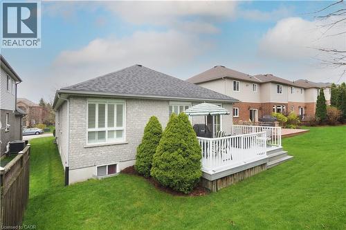Spacious backyard featuring an elevated deck - 565 Springwater Drive, Waterloo, ON - Outdoor With Deck Patio Veranda