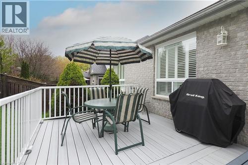 Grey composite decking with a white railing system - 565 Springwater Drive, Waterloo, ON - Outdoor With Deck Patio Veranda With Exterior