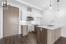 595 Lilymac Unit# 106, Windsor, ON  - Indoor Photo Showing Kitchen With Upgraded Kitchen 