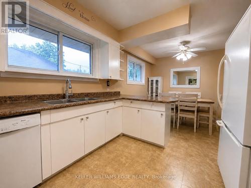 Main Floor Kitchen - 917 Orpha Street, Burlington, ON - Indoor Photo Showing Kitchen With Double Sink