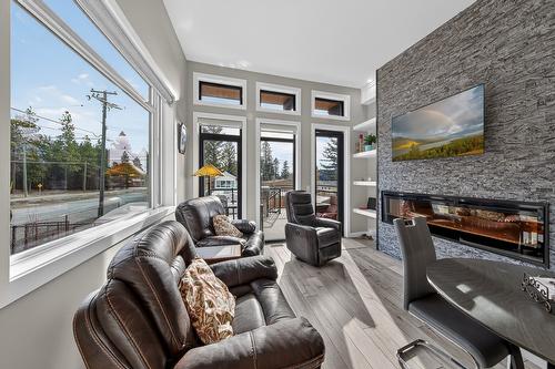 4978 Ponderosa Crescent, Canal Flats, BC - Indoor Photo Showing Living Room With Fireplace
