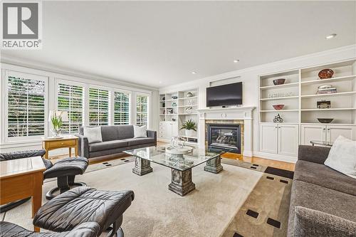 7 Colonial Crescent, Oakville, ON - Indoor Photo Showing Living Room With Fireplace
