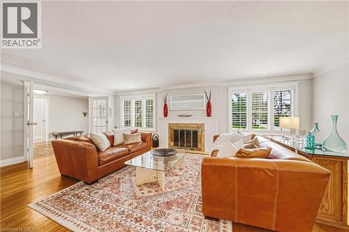 7 Colonial Crescent, Oakville, ON - Indoor Photo Showing Living Room With Fireplace