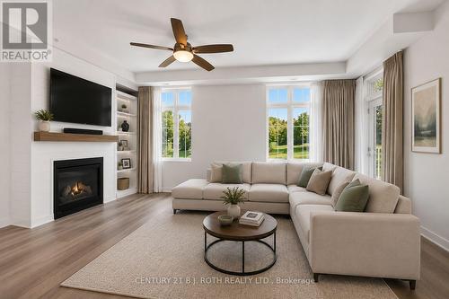 310 - 40 Horseshoe Boulevard, Oro-Medonte, ON - Indoor Photo Showing Living Room With Fireplace