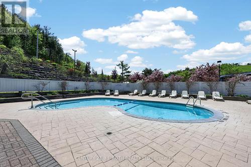 310 - 40 Horseshoe Boulevard, Oro-Medonte, ON - Outdoor With In Ground Pool With Backyard