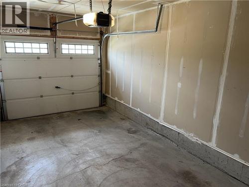 With garage door opener - 56 Eliza Avenue, Kitchener, ON - Indoor Photo Showing Garage