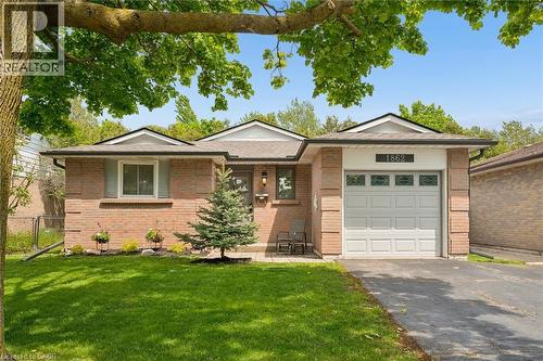 Brick ranch-style exterior with a gabled roofline and attached single-car garage - 1862 Briarwood Drive, Cambridge, ON - Outdoor