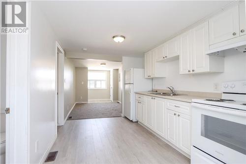 114 Edward Avenue, Coniston, ON - Indoor Photo Showing Kitchen With Double Sink