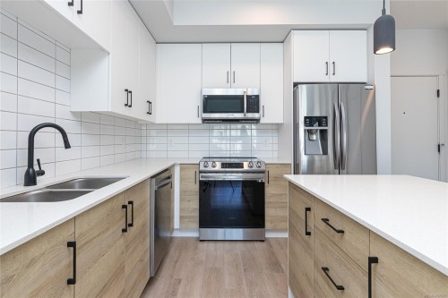 #217-2469 Gateway Rd, Langford, BC - Indoor Photo Showing Kitchen With Stainless Steel Kitchen With Double Sink With Upgraded Kitchen