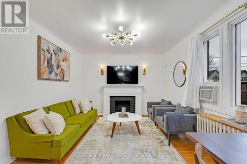 15 - 2 Vineland Avenue, Hamilton, ON - Indoor Photo Showing Living Room With Fireplace