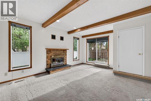 83 Groome Avenue, Regina, SK - Indoor With Fireplace
