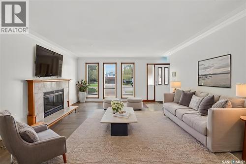 83 Groome Avenue, Regina, SK - Indoor Photo Showing Living Room With Fireplace