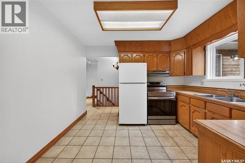 83 Groome Avenue, Regina, SK - Indoor Photo Showing Kitchen With Double Sink
