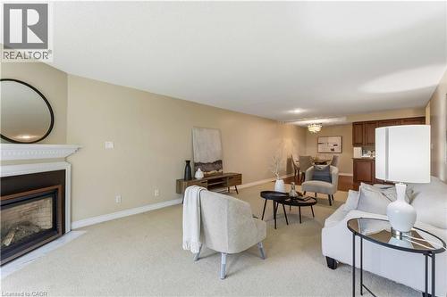 970 Golf Links Road Unit# 205, Ancaster, ON - Indoor Photo Showing Living Room With Fireplace