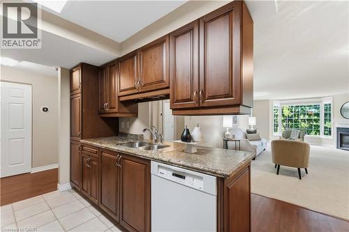970 Golf Links Road Unit# 205, Ancaster, ON - Indoor Photo Showing Kitchen With Double Sink