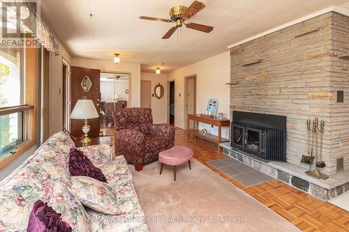 22 Glendale Road, Tiny, ON - Indoor Photo Showing Living Room With Fireplace