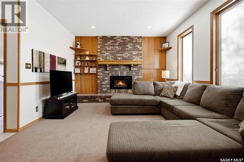2447 Swayze Crescent, Regina, SK - Indoor Photo Showing Living Room With Fireplace