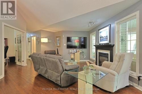 10419 Pinetree Drive, Lambton Shores (Grand Bend), ON - Indoor Photo Showing Living Room With Fireplace