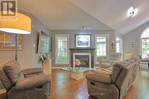 10419 Pinetree Drive, Lambton Shores (Grand Bend), ON - Indoor Photo Showing Living Room With Fireplace