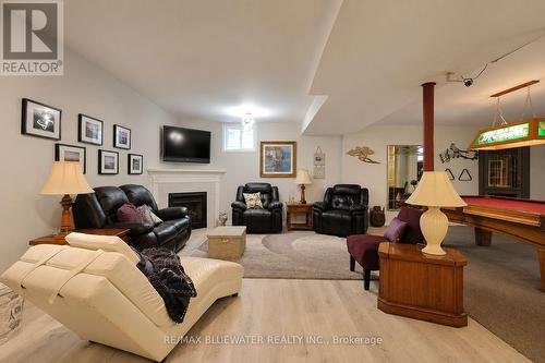 10419 Pinetree Drive, Lambton Shores (Grand Bend), ON - Indoor Photo Showing Living Room With Fireplace