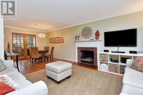 32 Arundel Avenue, Ottawa, ON - Indoor Photo Showing Living Room With Fireplace