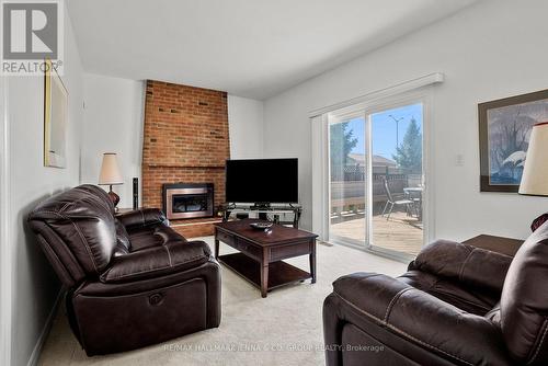 43 Elke Drive, Ottawa, ON - Indoor Photo Showing Living Room With Fireplace