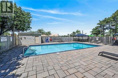 700 Dynes Road Unit# 101, Burlington, ON - Outdoor With In Ground Pool