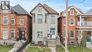 Three-story stucco exterior featuring multiple bay windows and a central entrance - 181 West Avenue N Unit# 4, Hamilton, ON  - Indoor Photo Showing Other Room 