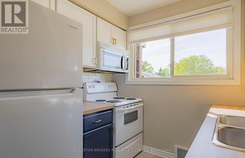 11 - 316 Forsyth Street, Gananoque, ON - Indoor Photo Showing Kitchen With Double Sink