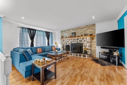 Salon - 226 Rue Houde, Saint-Eustache, QC - Indoor Photo Showing Living Room With Fireplace