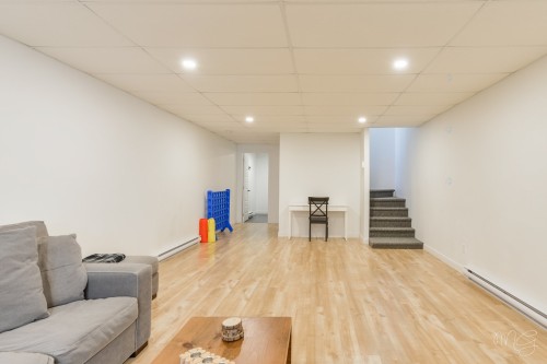 Salle familiale - 71 Rue Du Hameau, Saint-Côme, QC - Indoor Photo Showing Other Room