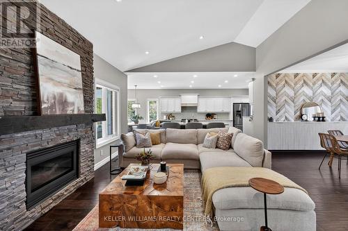50 Glenhuron Drive, Springwater, ON - Indoor Photo Showing Living Room With Fireplace