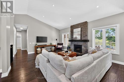 50 Glenhuron Drive, Springwater, ON - Indoor Photo Showing Living Room With Fireplace