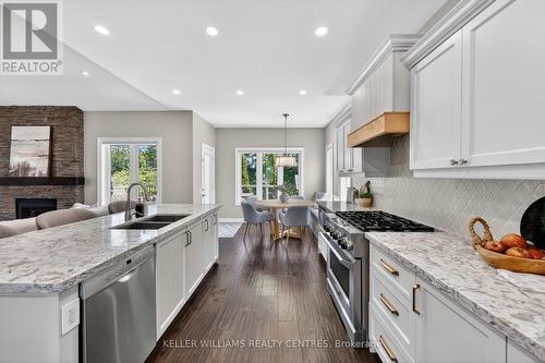 50 Glenhuron Drive, Springwater, ON - Indoor Photo Showing Kitchen With Double Sink With Upgraded Kitchen