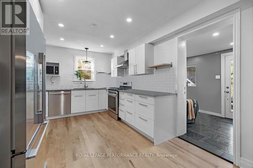 Photo prior to tenant occupancy *digitally staged* - 81 Ivy Crescent, Ottawa, ON - Indoor Photo Showing Kitchen With Stainless Steel Kitchen With Upgraded Kitchen