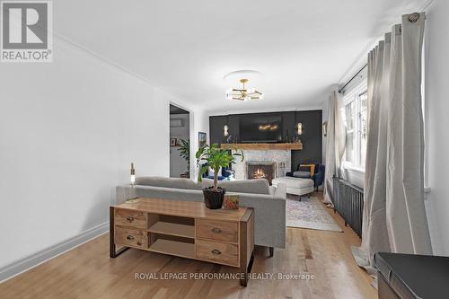 Photo prior to tenant occupancy *digitally staged* - 81 Ivy Crescent, Ottawa, ON - Indoor With Fireplace