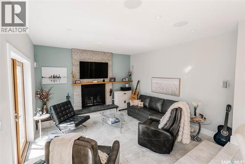 71 Bain Crescent, Saskatoon, SK - Indoor Photo Showing Living Room With Fireplace
