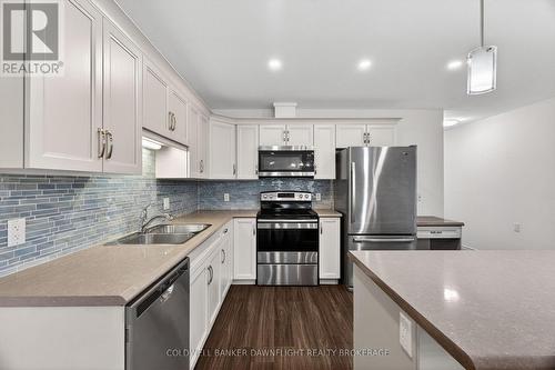 18 Devon Drive, South Huron (Exeter), ON - Indoor Photo Showing Kitchen With Double Sink With Upgraded Kitchen